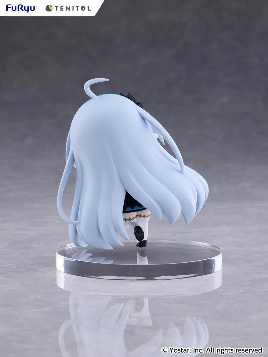 Stella Sora TENITOL Mini Tyrant Figure by FuRyu featuring a light-blue-haired anime girl with blue eyes wearing a black and blue outfit with gold accents, black gloves, and white stockings while holding a small blue device.