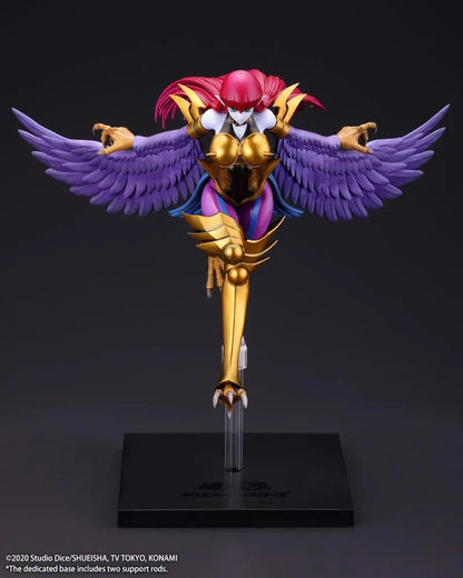 Harpie Lady figure posed in flight with outstretched purple wings, red hair, and gold Cyber Shield armor above a black display base.