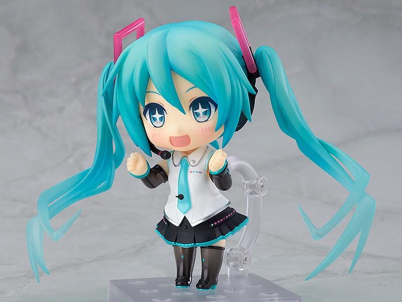 Hatsune Miku Nendoroid Hatsune Miku V4X Figure Rerelease with turquoise twin tails, headset, and black white teal Vocaloid outfit