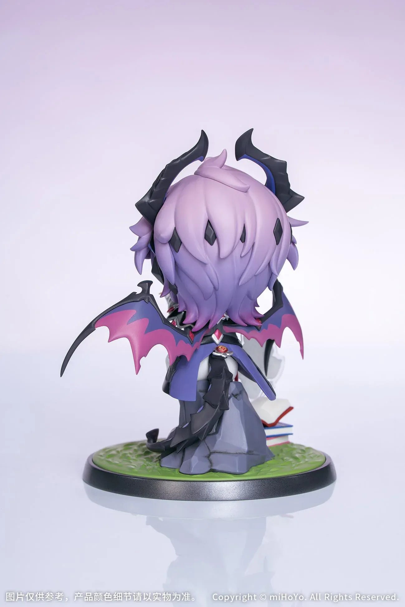 Genshin Impact Durin Floral Wanderings ver. with Bonus Non Scale Figure featuring Durin with lavender hair, horns, bat-like wings, books, companion illustration, and themed display base.