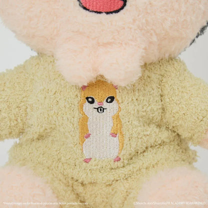 The Disastrous Life of Saiki K. Riki Nendo Fukamokogurumi Plushie featuring black hair, a blonde mohawk, green eyes, a goofy smile, and a fluffy yellow outfit with an embroidered hamster design in a cute seated pose.