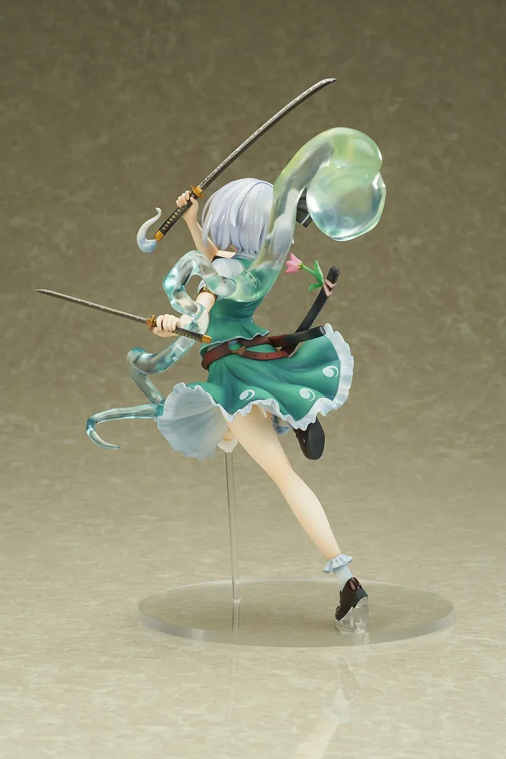 Touhou Project Youmu Konpaku figure wielding two swords in an airborne pose, wearing a green outfit with a translucent swirling spirit effect.