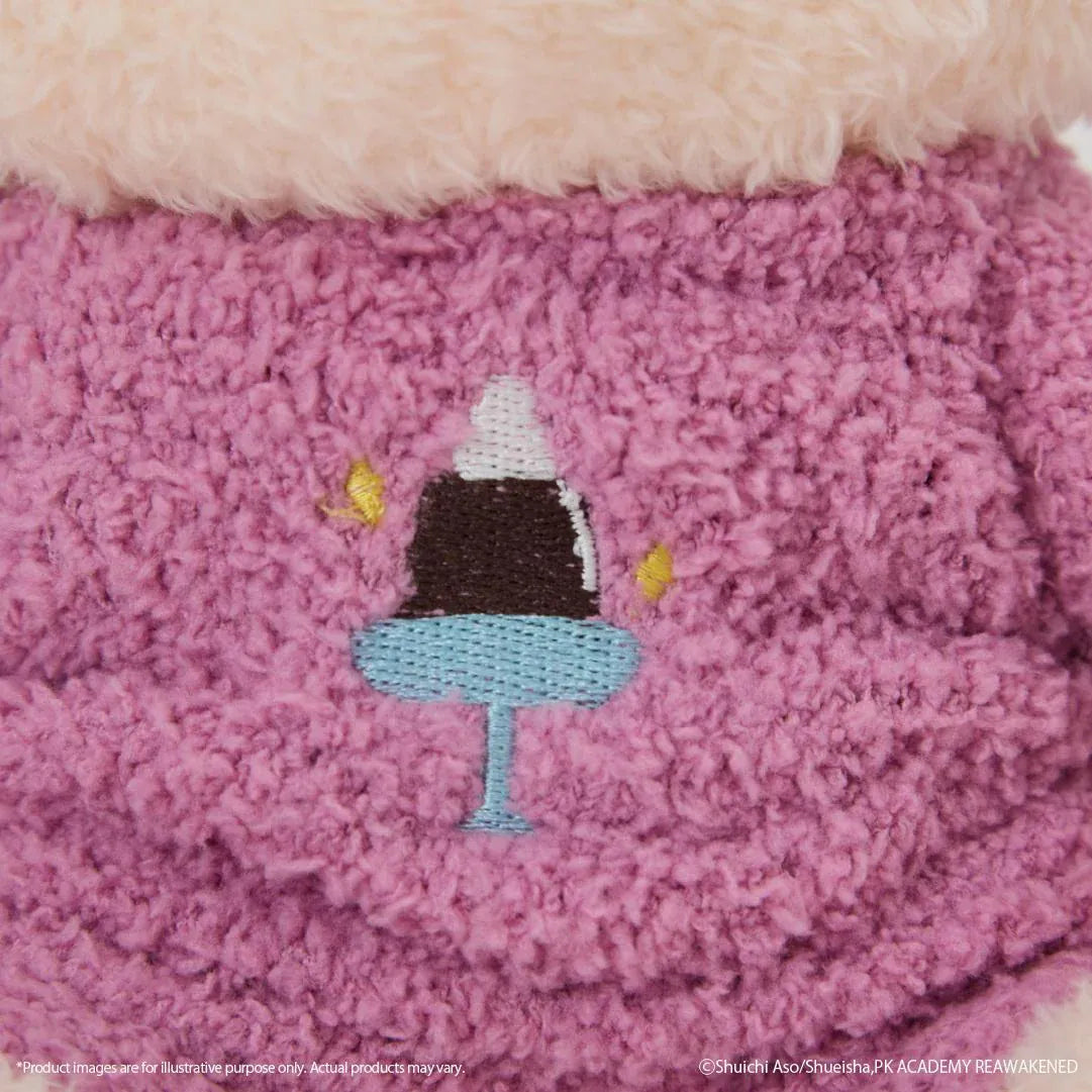 The Disastrous Life of Saiki K. Kusuo Saiki Fukamokogurumi Plushie featuring bright pink hair, green-tinted glasses, white psychic limiters with pink pom-poms, and a fluffy pink outfit with an embroidered coffee jelly design in a cute seated pose.
