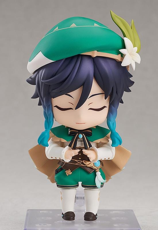 Genshin Impact Nendoroid Venti Figure Rerelease featuring Venti with green outfit, bard hat, braided teal hair accents, winking expression, and lyre accessory.