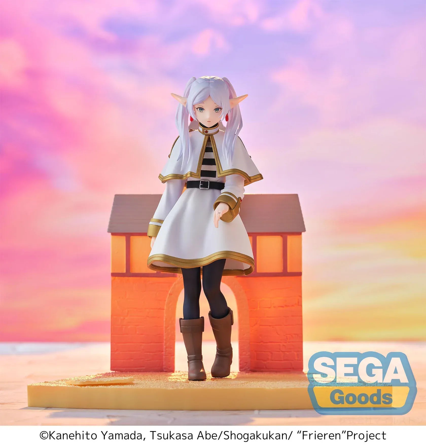 Frieren Beyond Journey's End Luminasta Frieren Eternal Love Figure with white and gold outfit and scenic building backdrop
