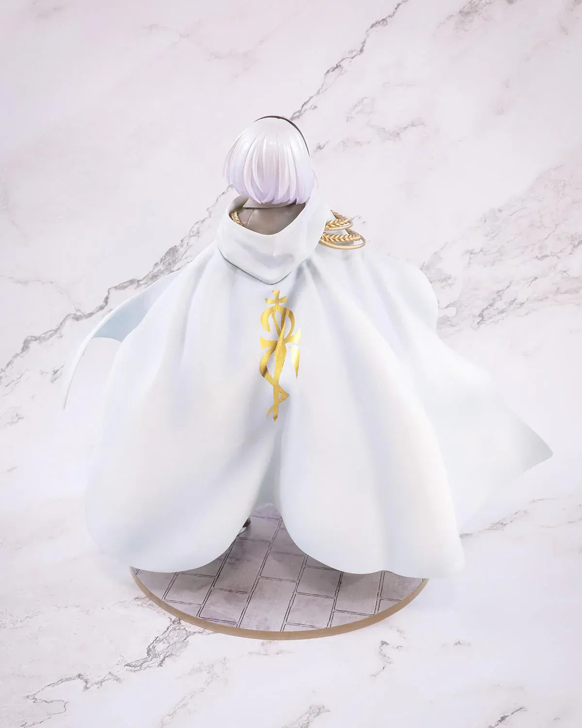 Wandering Witch The Journey of Elaina Amnesia 1/7 Scale Figure featuring Amnesia with short silver hair, white cape, sword, and stone-style display base.