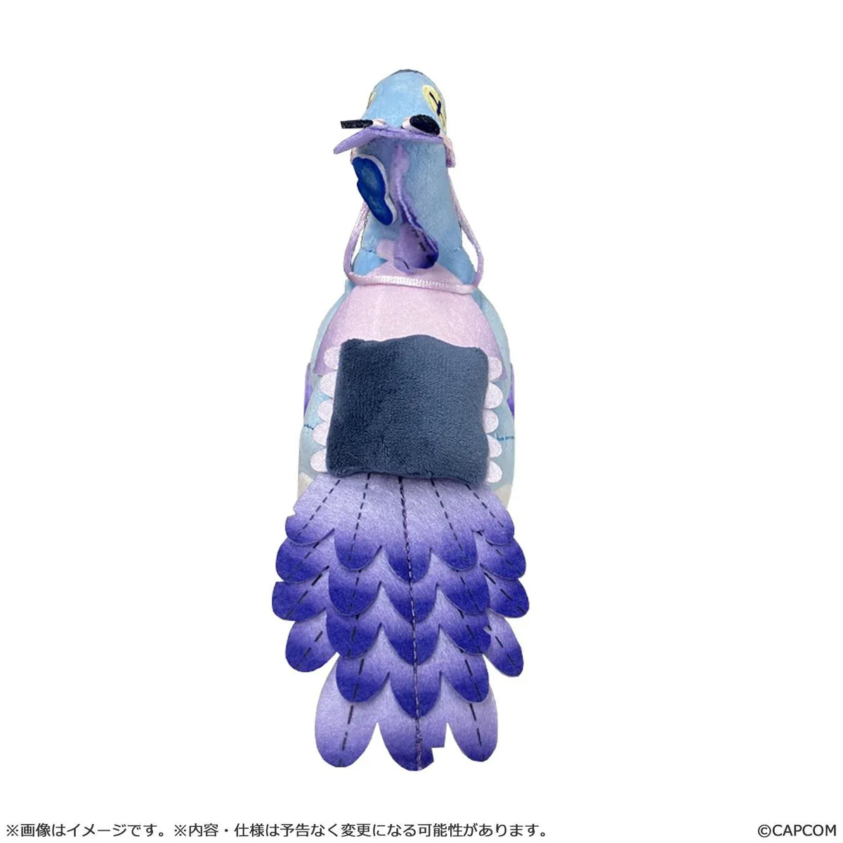 Monster Hunter Wilds Seikret Living Doll Caparison Plushie featuring a blue bird-like companion with purple feathers, button-style eyes, patchwork stitching, a decorative saddle, and dark blue feet.