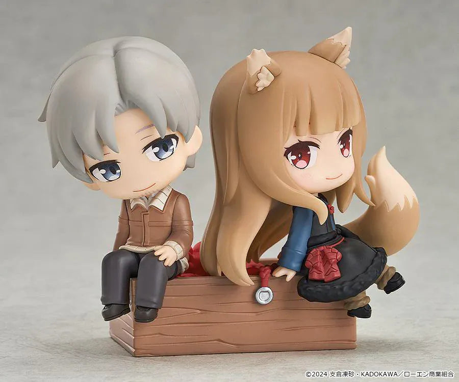 Spice and Wolf Mini Memory Lawrence and Holo chibi figure set sitting on a wooden crate base