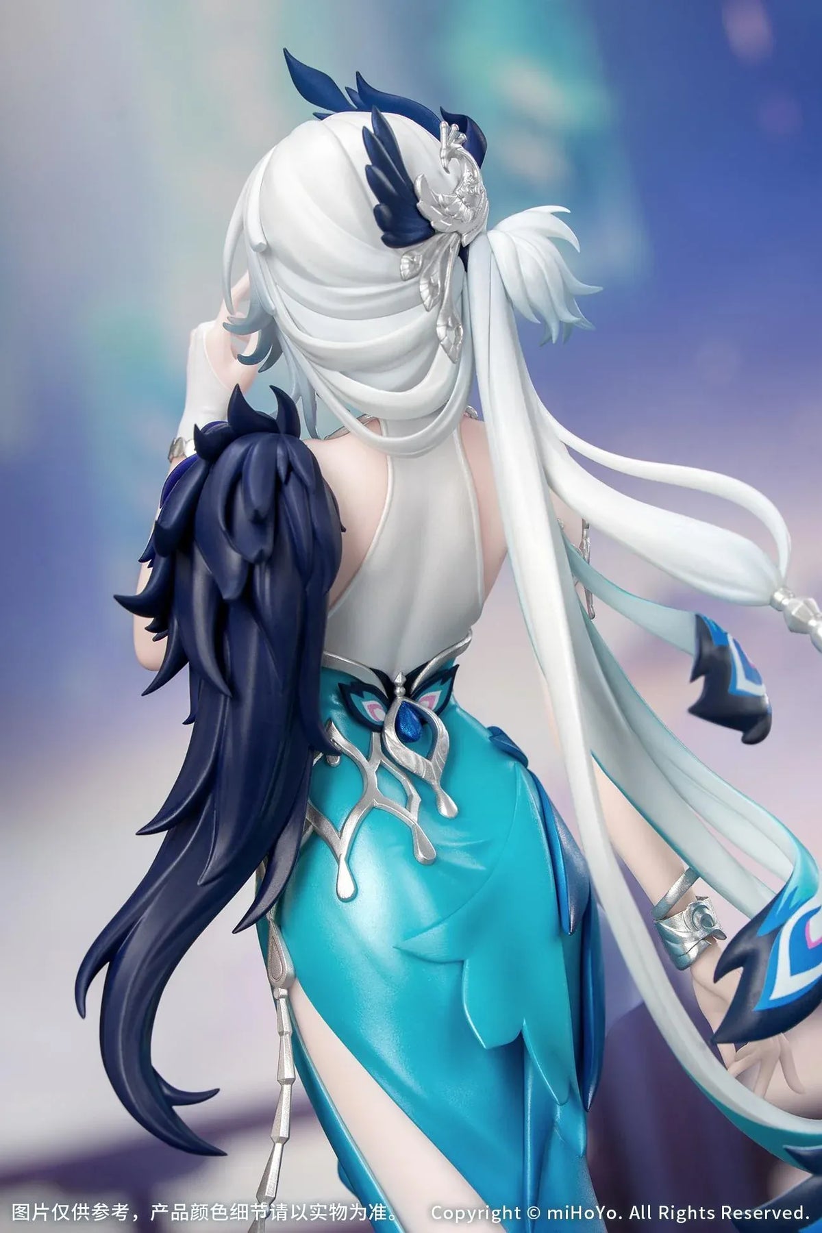 Yao Guang 1/8 scale figure wearing an elegant white-and-teal outfit with silver ornaments and feather-inspired decorations.