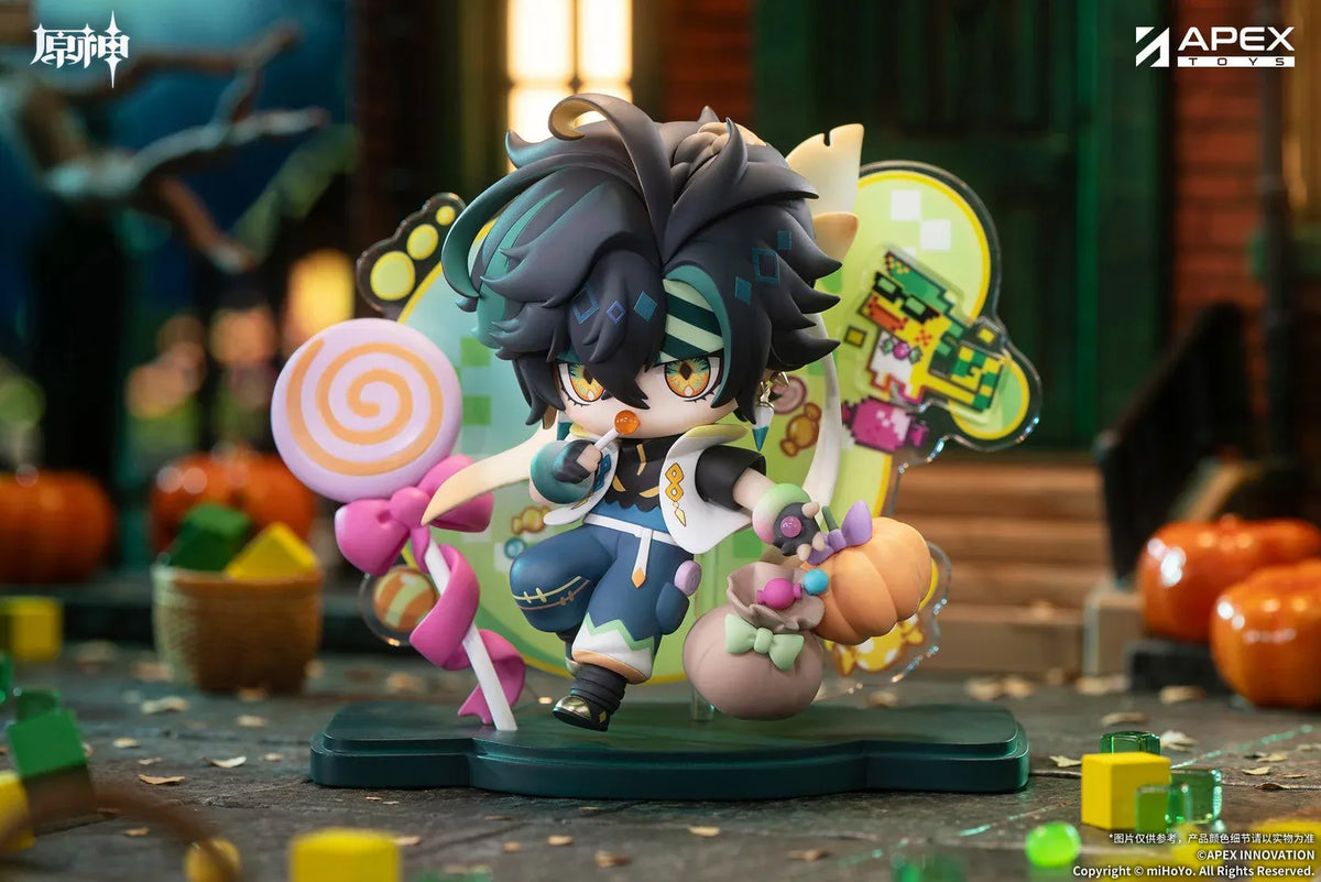 Genshin Impact You Ye Qi Xiang Series chibi Kinich figure holding a lollipop, surrounded by candy, a pumpkin, and a pixel-art backdrop.