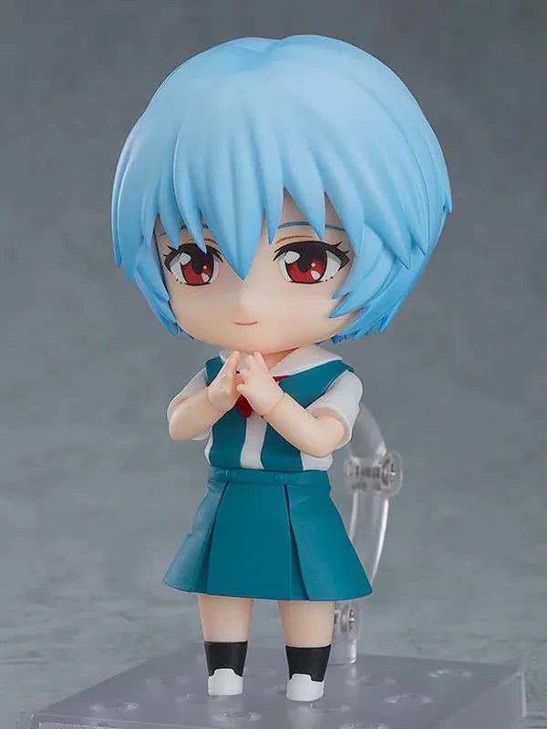 Rebuild of Evangelion Nendoroid Rei Ayanami Figure Rerelease featuring Rei with light blue hair, red eyes, school uniform, and school bag accessory.