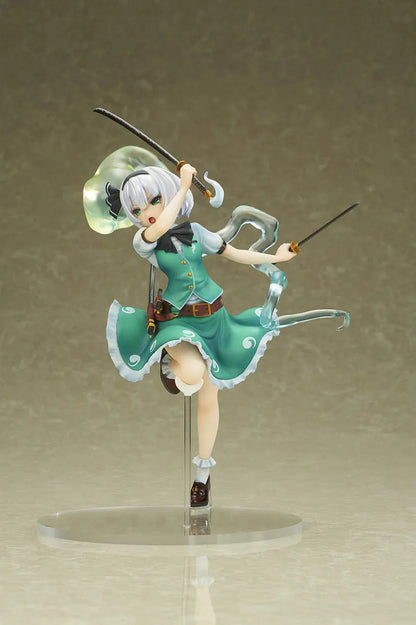 Touhou Project Youmu Konpaku figure wielding two swords in an airborne pose, wearing a green outfit with a translucent swirling spirit effect.