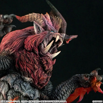 Monster Hunter Capcom Figure Builder Creator's Model Teostra (Rerelease) featuring a fearsome Elder Dragon with massive outstretched wings, a fiery red mane, sharp horns, detailed scales, and red flame effects atop a rocky display base.