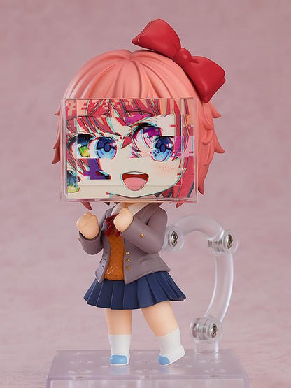 Sayori Nendoroid figure from Doki Doki Literature Club smiling with red bow chibi figure