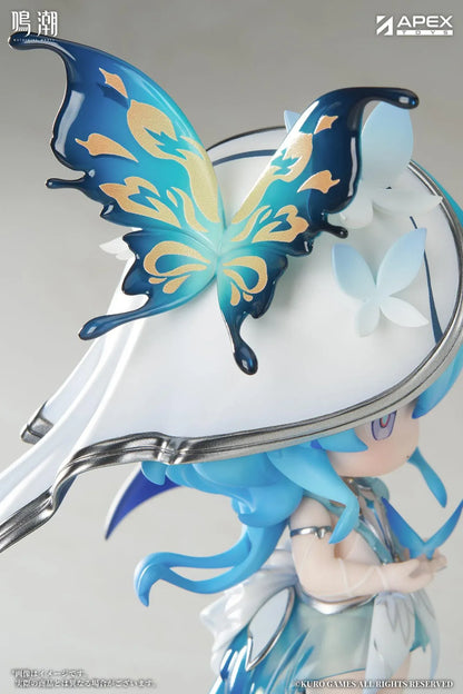 Chibi Shorekeeper Jinseki Series figure with blue hair, a butterfly-decorated headpiece, and a blue butterfly held in her hands, standing on a water-inspired base.