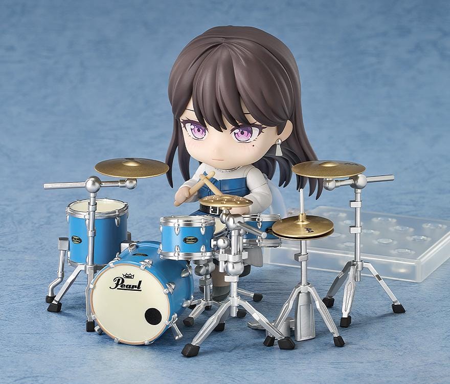 BanG Dream Nendoroid Taki Shiina Figure featuring Taki in a chibi-style design with long dark hair, purple eyes, blue outfit, and drumstick accessory.