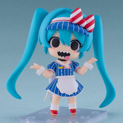 Hatsune Miku Nendoroid Hatsune Miku Mesmerizer Ver. Figure featuring Miku in a chibi-style design with teal twin tails, striped blue outfit, red and white bow, and apron-style details.
