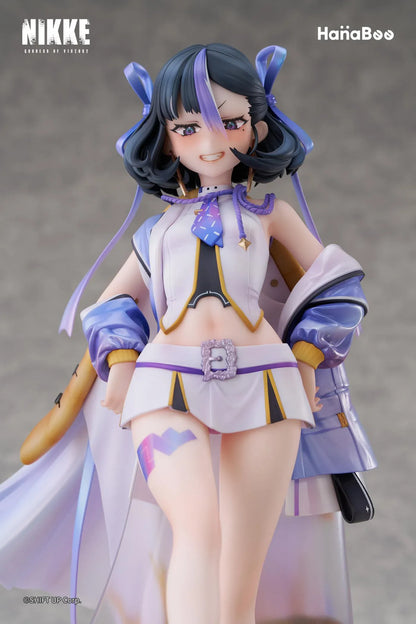 Goddess of Victory Nikke Syuen Deluxe Edition 1/6 Scale Figure featuring Syuen in a white-and-purple outfit with ribbon details, themed base, chibi mascot accent, can badge, and acrylic-style bonus artwork.