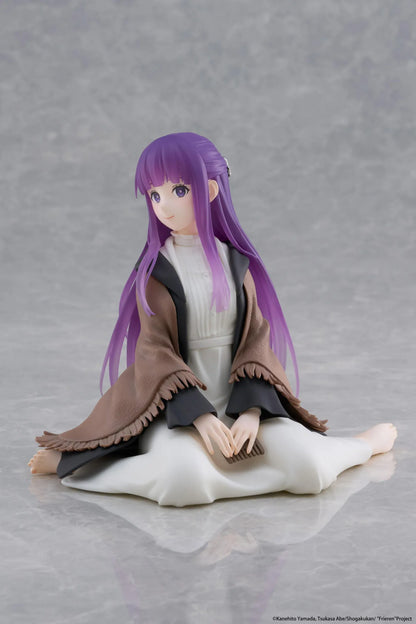 Frieren Beyond Journey's End Desktop Cute Fern Figure with purple hair wearing a shawl and white dress in a seated pose