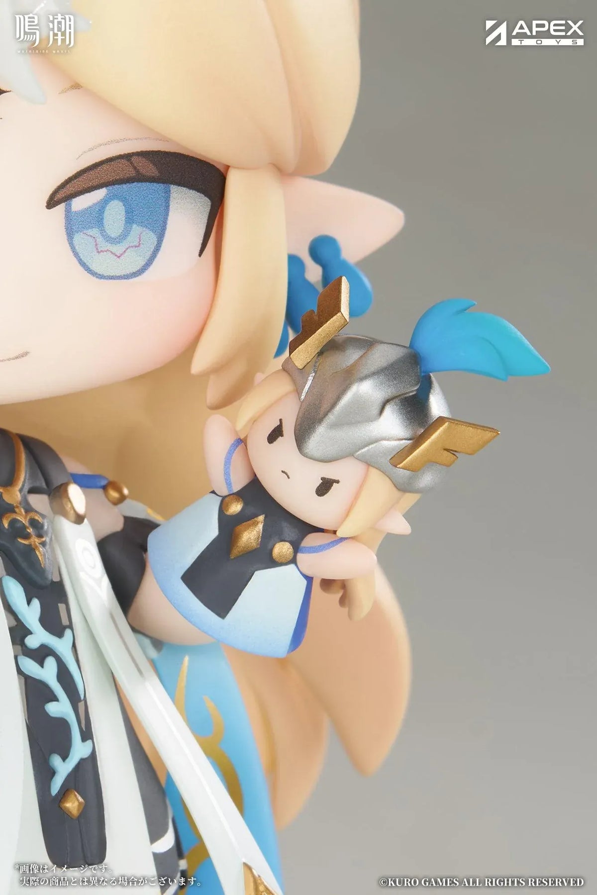 Chibi Cartethyia Jinseki Series figure with blonde hair, blue eyes, a pale blue headpiece, and a small armored companion, standing on a green floral base.