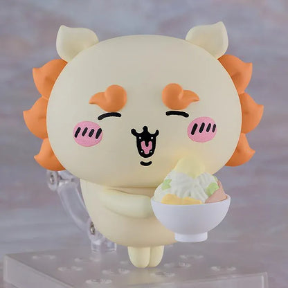 Chiikawa Nendoroid Shisa figure with a cream-colored body, orange mane and eyebrows, pink cheeks, and a joyful smiling expression.