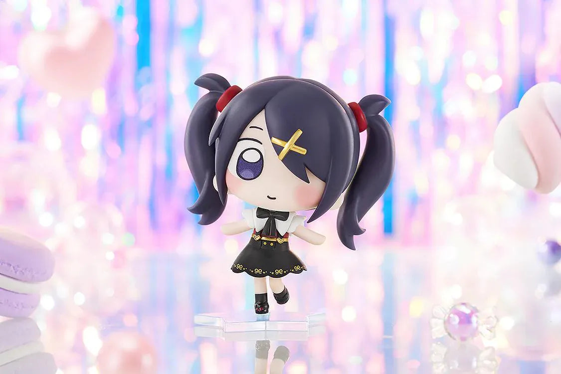 NEEDY STREAMER OVERLOAD Ame chibi figure with dark purple twin tails, gold cross hair clip, black and white outfit, and blue star-shaped base.
