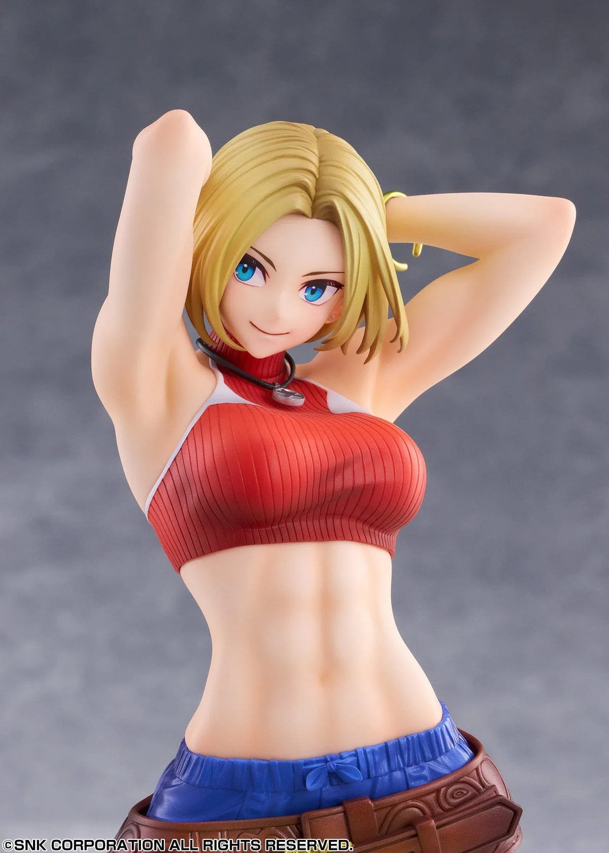 Blue Mary Limited Edition 1/7 scale figure wearing a red crop top, blue pants, brown belt, and white sneakers in a confident standing pose.