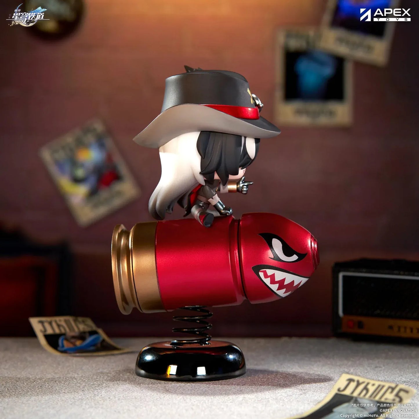 Honkai Star Rail Happy Shake Boothill Chibi Figure sitting on a red spring-mounted rocking base with his signature cowboy hat