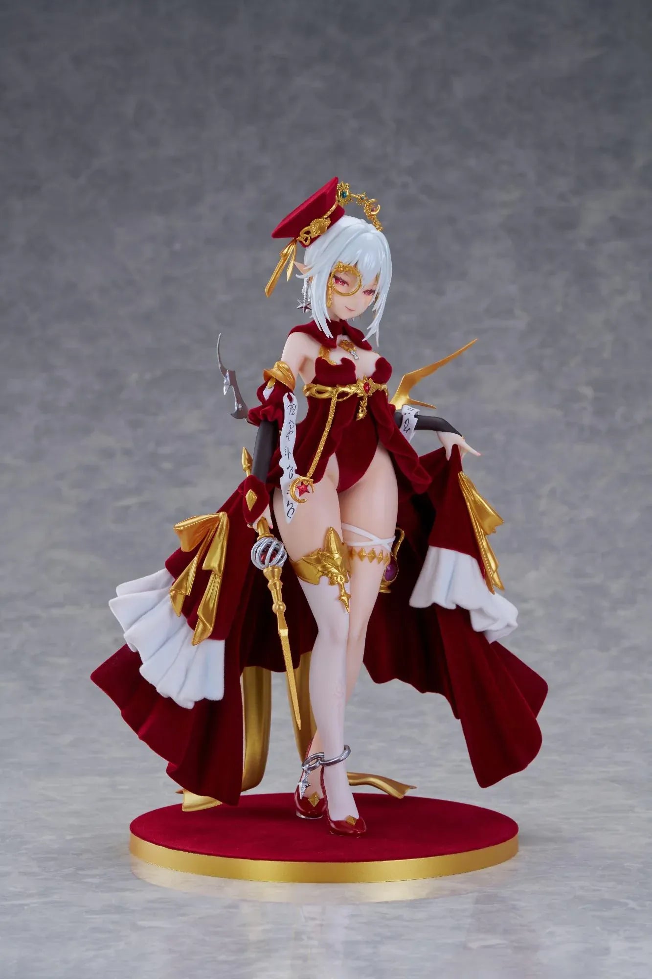 Alchemist Formal Dress Ver. 1/7 Scale Figure featuring a white-haired character in a red formal dress with gold accessories, ornate staff, cape, and red display base.