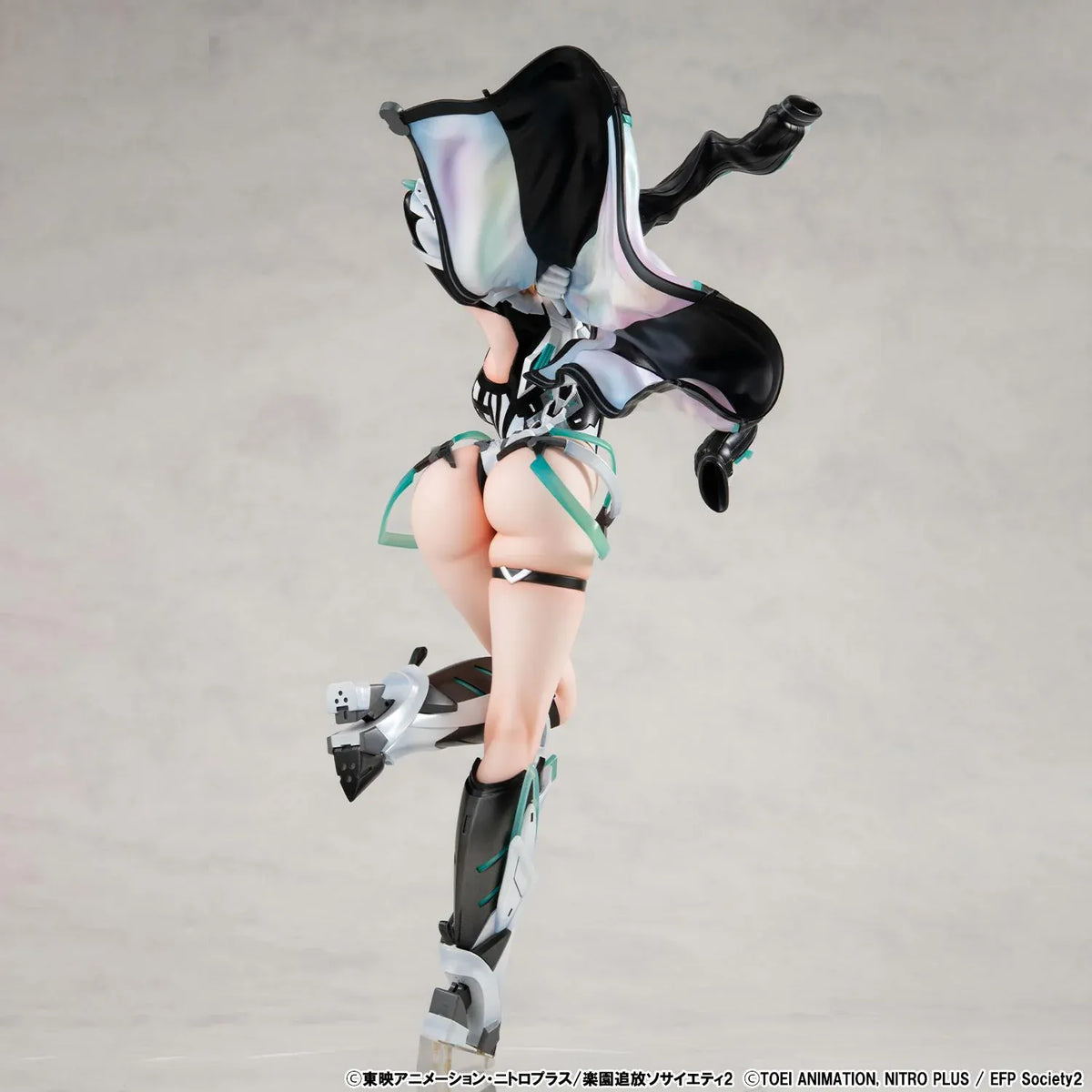 Lucrea Gabriel figure with golden hair, red eyes, black and white futuristic armor, turquoise accents, and a flowing iridescent-lined jacket.