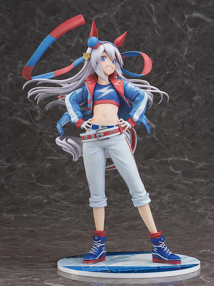 Uma Musume: Cinderella Gray Tamamo Cross 1/7 Scale Figure featuring Tamamo Cross in her vibrant blue and red racing jacket with confident pose and long flowing twin tails.