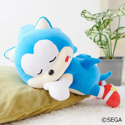 Sonic & Friends Sonic sleeping plush lying on his side with closed eyes, white gloves, and red shoes.