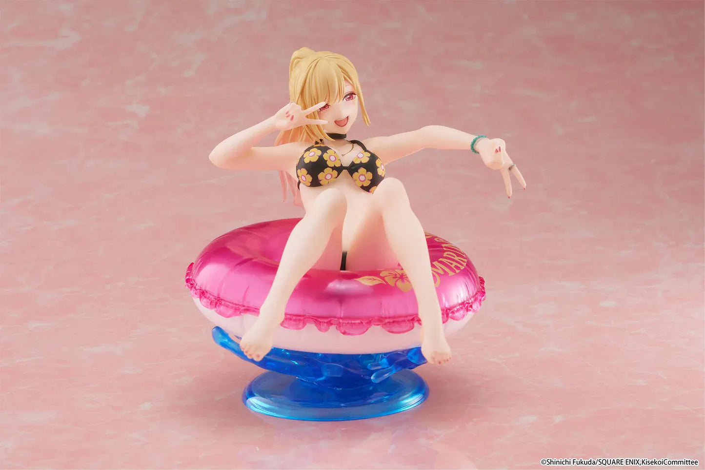 My Dress-Up Darling Aqua Float Girls Marin Kitagawa Figure Rerelease featuring Marin relaxing on a pink swim float with floral swimsuit and translucent water-style base.