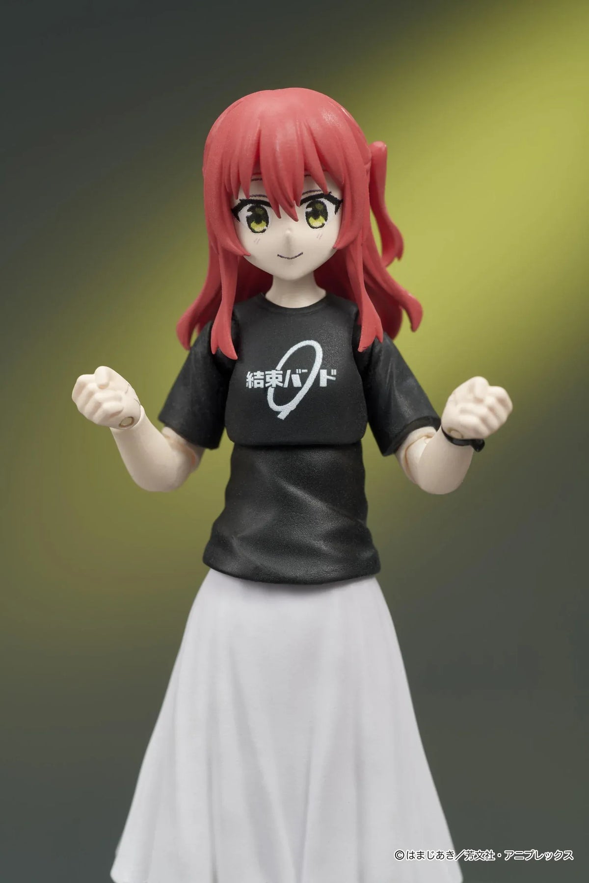 Bocchi the Rock! DIGACTION Ikuyo Kita figure winking while holding a light blue guitar, wearing a black band T-shirt and white pleated skirt.