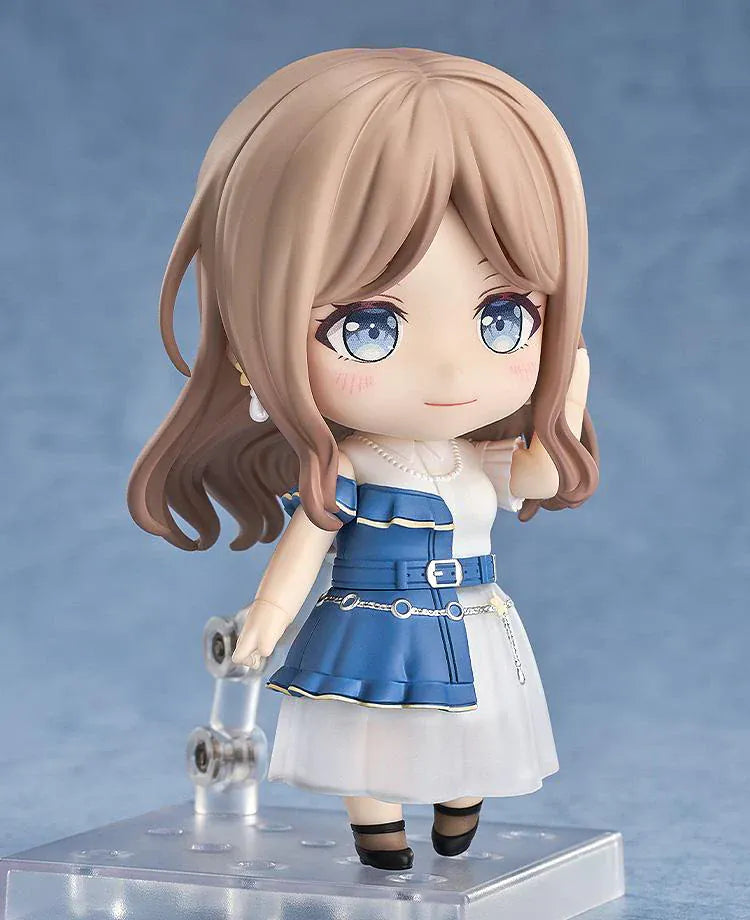 Nendoroid figure of Soyo Nagasaki from BanG Dream! holding a sunburst bass guitar, wearing a blue dress with a white skirt and black shoes.