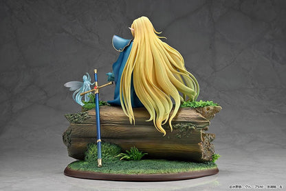 Record of Lodoss War Deedlit figure seated on a log in green clothing and blue armor, with flowing blonde hair, a winged companion, and a woodland base.