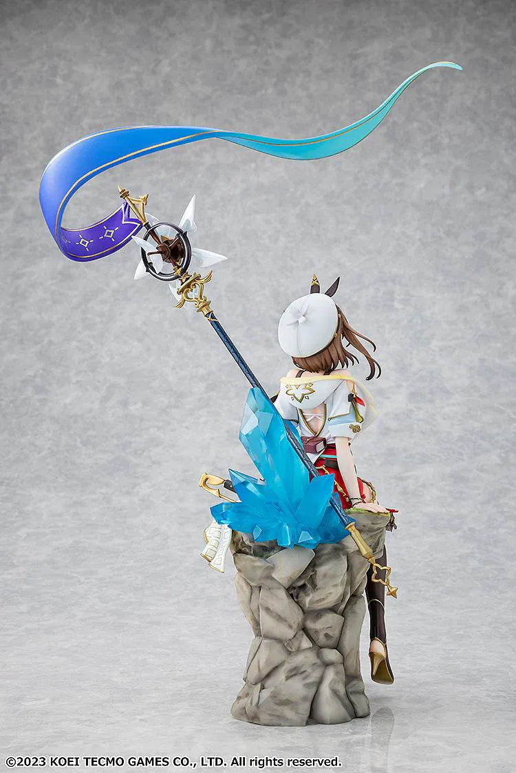 Atelier Ryza 3 Alchemist of the End and the Secret Key Ryza Reisalin Stout 1/7 Scale Figure featuring Ryza seated on a rock base with her alchemy staff and detailed adventurer outfit.
