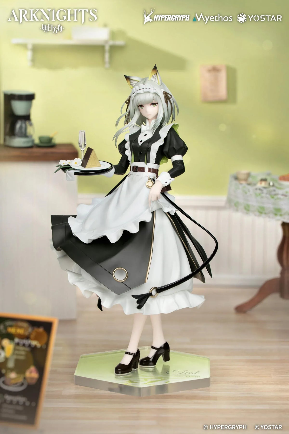 Kal'tsit The Remains of Time Ver. figure wearing a flowing black and white maid dress and holding a serving tray on a translucent green base.