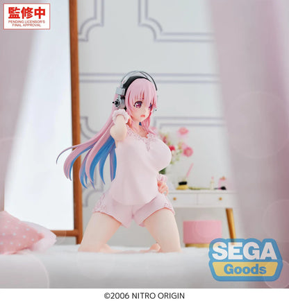 Nitroplus Yumemirize Super Sonico figure wearing pink pajamas and headphones in a kneeling pose