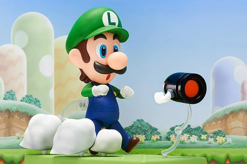 Super Mario Nendoroid Luigi figure wearing his green hat and blue overalls in a running pose