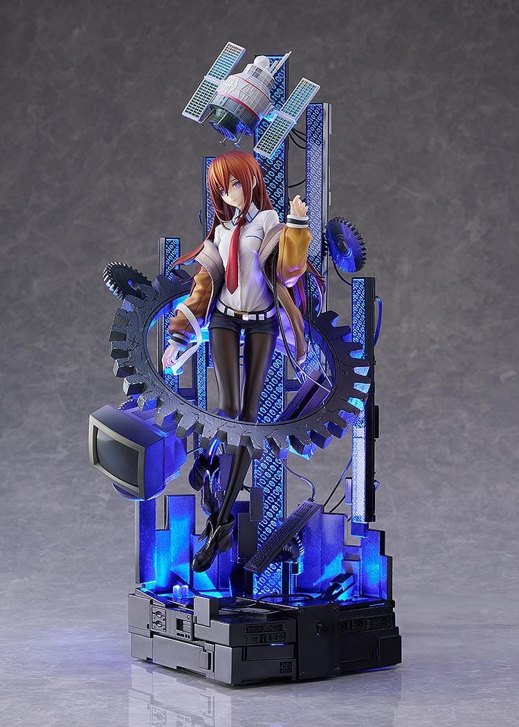 Kurisu Makise 1/7 scale figure surrounded by gears, binary-patterned panels, a satellite, retro monitor, and computer equipment with red-orange accents.