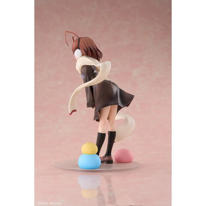 CLANNAD Nagisa Furukawa 1/6 Scale Figure featuring a smiling brown-haired anime girl wearing a dark school uniform, cream-colored scarf, white earmuffs, and black knee-high socks, surrounded by colorful Dango Daikazoku characters.