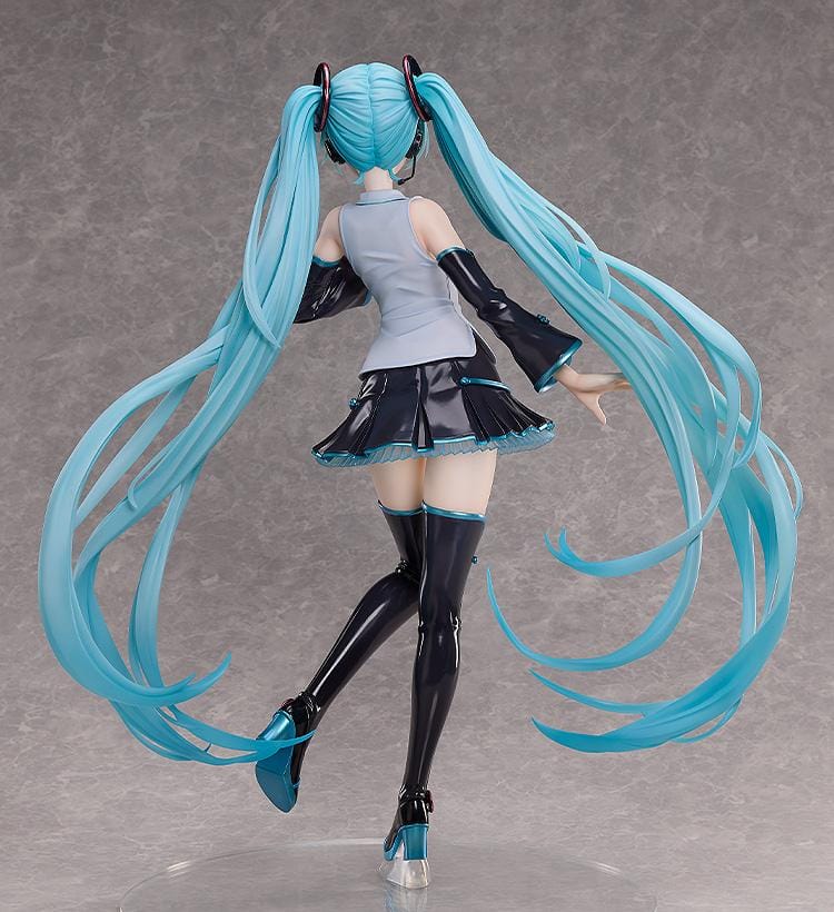 Hatsune Miku V4 CHINESE 1/3 Scale Figure featuring Miku with long teal twin tails, white and black outfit, teal accents, and an elegant display pose.
