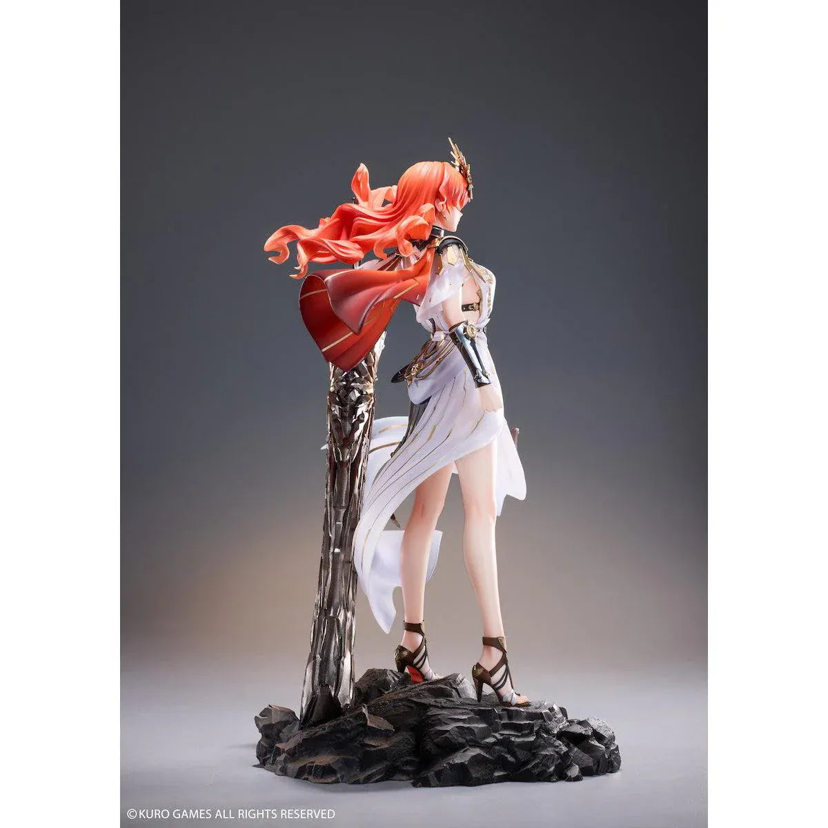 Wuthering Waves Augusta 1/7 Scale Figure with orange-red hair, white-and-gold outfit, armor accents, weapon accessory, and rocky display base