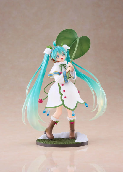Snow Miku All Stars 2015 Ver. AMP+ figure wearing a white flower-inspired dress and holding an oversized green leaf.