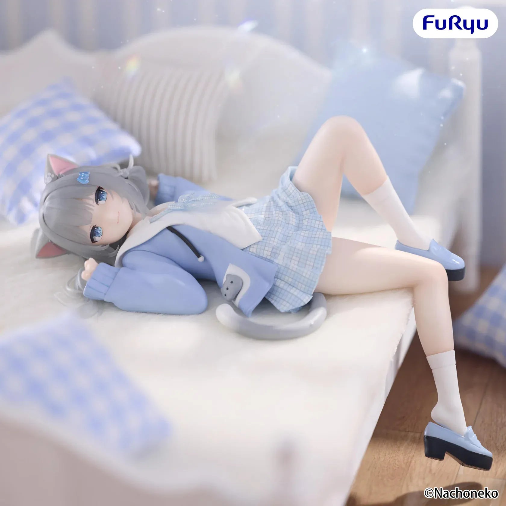 Nachoneko Noodle Stopper Figure by FuRyu featuring Nachoneko lying down in a blue outfit with cat ears and a cushion base.
