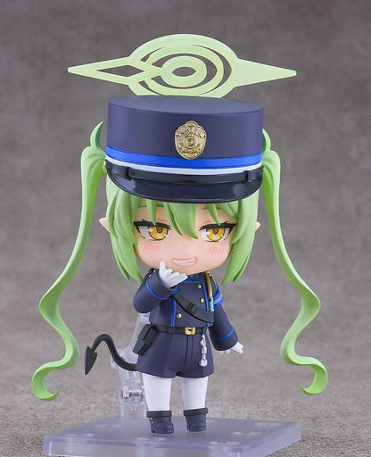 Blue Archive Nendoroid Nozomi Tachibana Figure featuring Nozomi with light green twin tails, golden eyes, oversized officer cap, academy uniform, and halo-style effect piece.