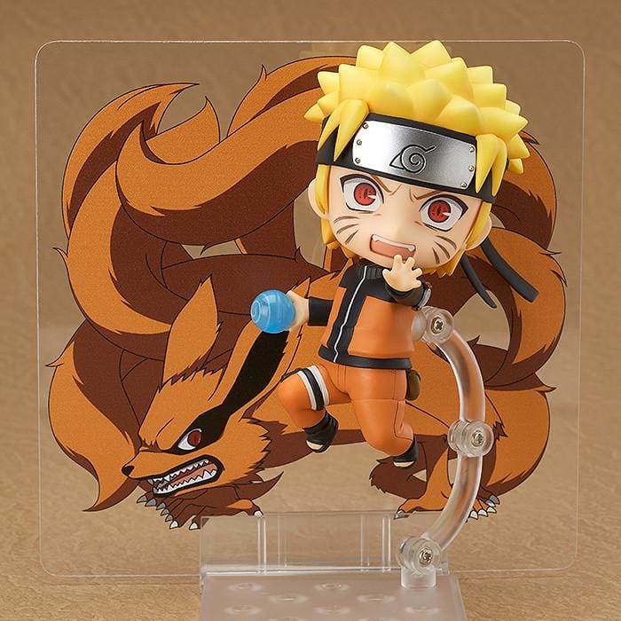 Chibi Nendoroid Naruto Uzumaki in orange jumpsuit performing the Shadow Clone Jutsu pose.