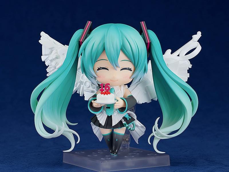 Hatsune Miku Happy 16th Birthday Ver. Nendoroid figure with turquoise twin-tails, white outfit, microphone, and translucent wings