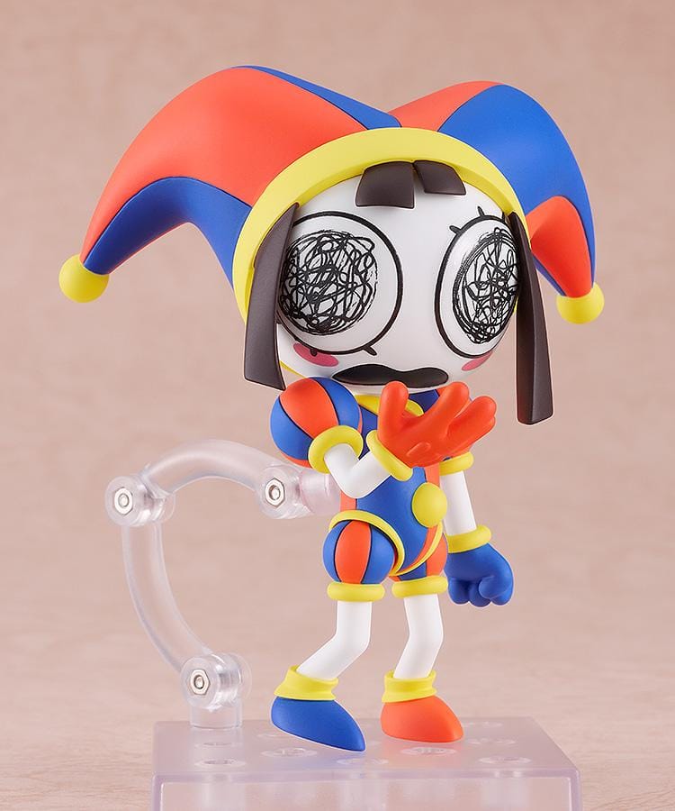 The Amazing Digital Circus Nendoroid Pomni Figure Rerelease featuring Pomni in a colorful red, blue, and yellow jester outfit with oversized hat and mismatched shoes.